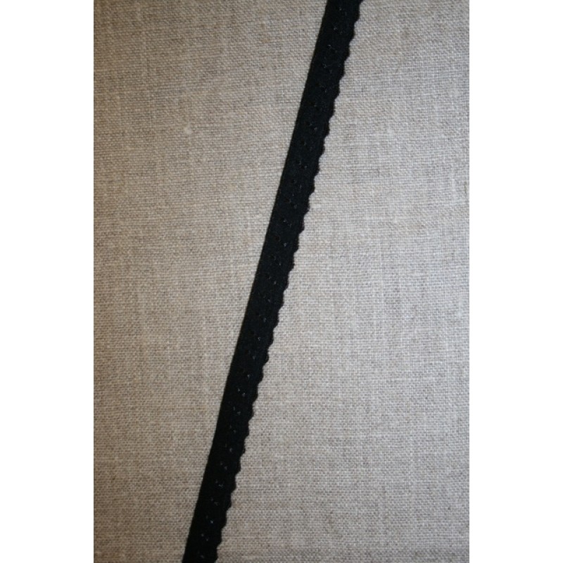 Foldeelastik med buet kant og prik, sort