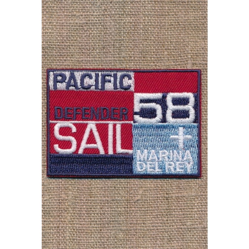 Strygemærke i rød blå denim "Pacific Defender Sail"