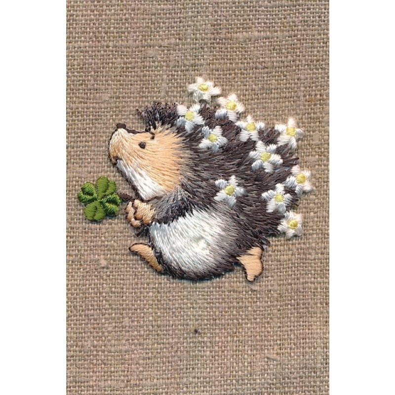 Motiv med pindsvin med blomster