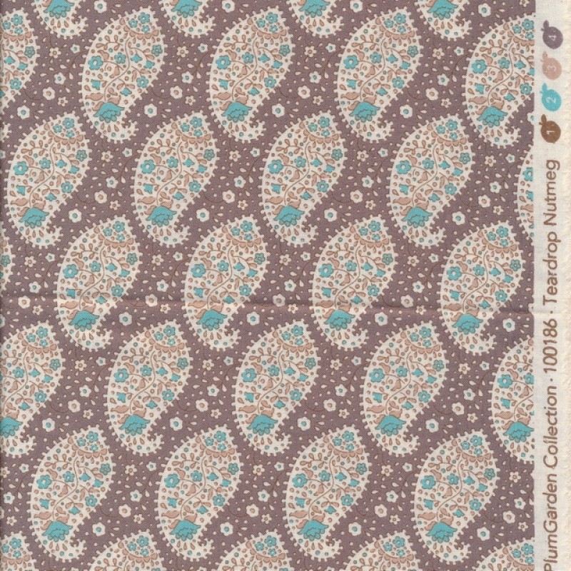 Tilda Patchwork stof i pudderbrun med sjalsmønster