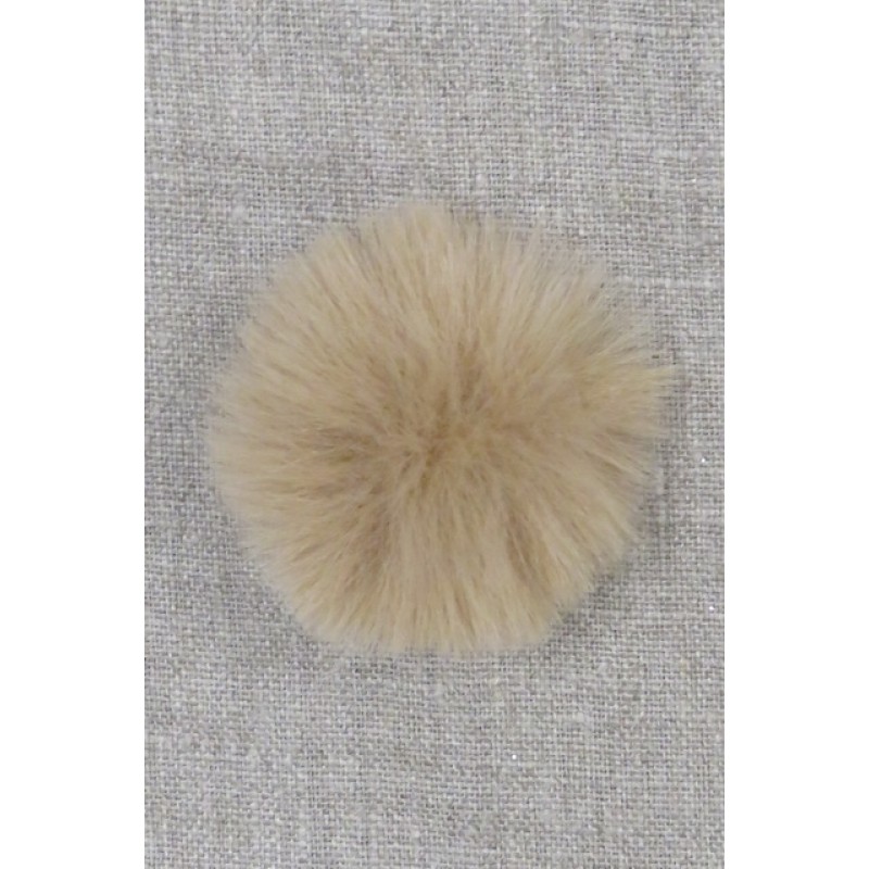 Pels-pompon i akryl i beige, 5 cm.