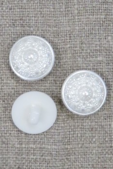 Rund knap i perlemorslook med mønster, 15 mm.