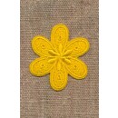 Motiv med blomst i gul