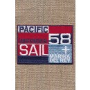 Strygemærke i rød blå denim "Pacific Defender Sail"