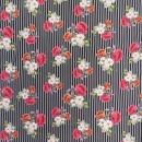Bomuldsjersey i sort med digitalprint med striber og blomster