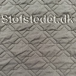 Quiltet stof med tern i sort med let stræk